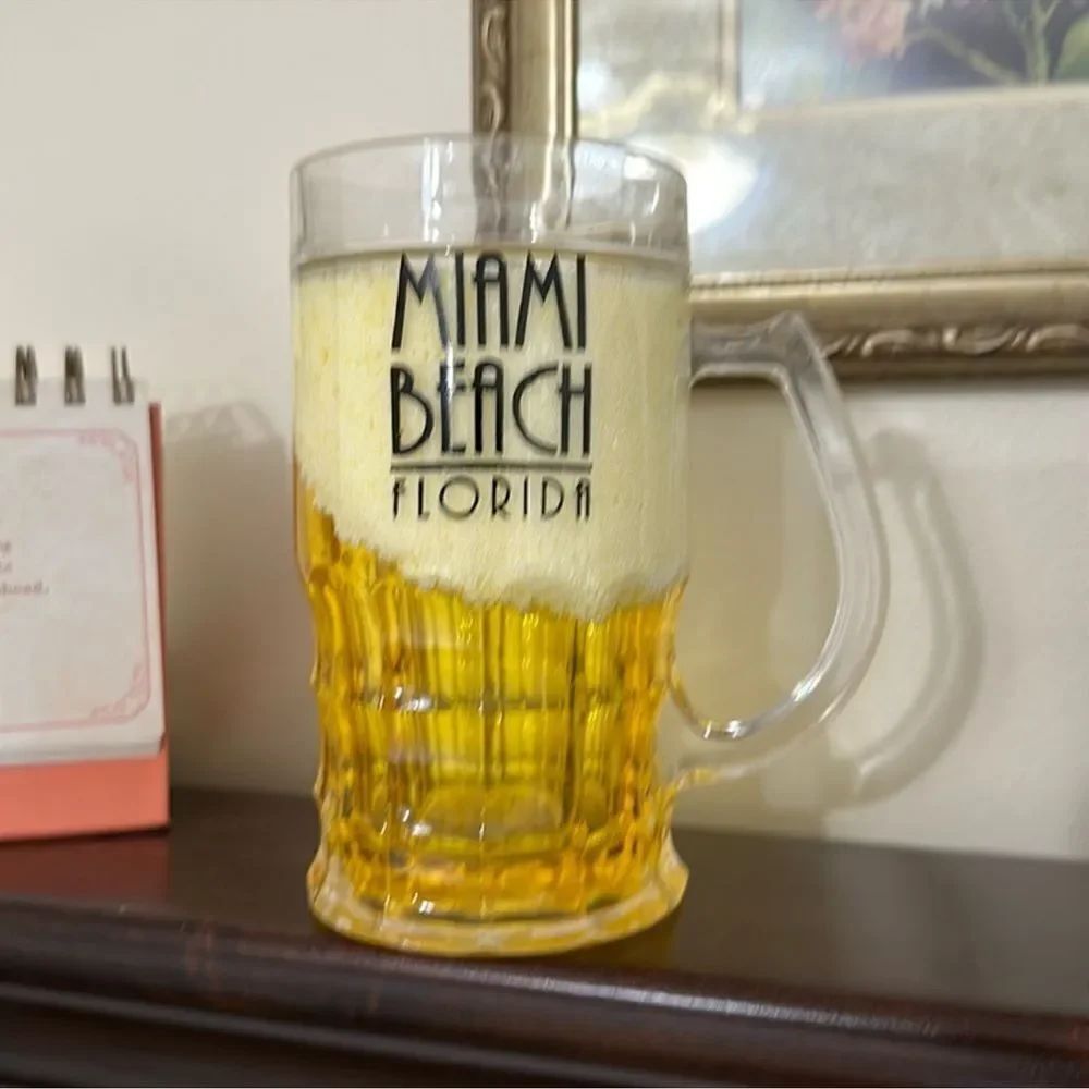 MIAMI BEACH FLORIDA clear plastic internal liquid beer glass with a handle